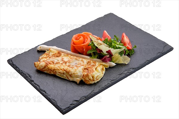 Omelette with salmon isolated on white