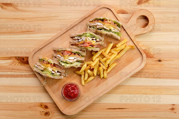 Club sandwich with american fries