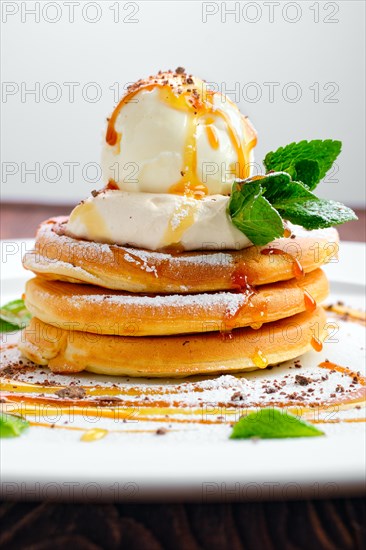 Macro photo of pancakes with ice cream