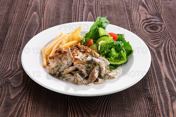 Grilled chicken fillet with oyster mushrooms