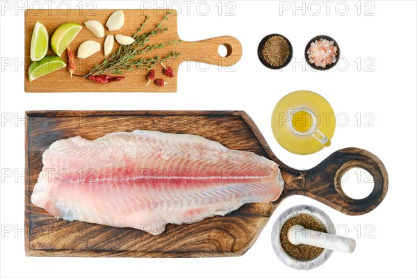Fresh raw fillet of pangasius isolated on white background