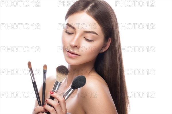 Beautiful young girl with a light natural make-up