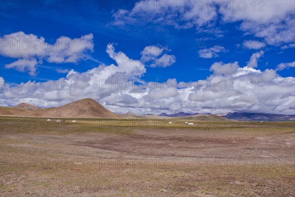 Open wide tibetan landscape along the road from Tsochen to Lhasa