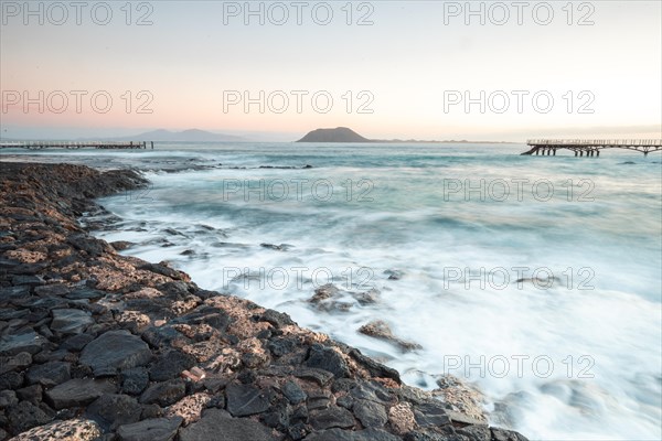 Long exposure at sunrise at the coast near Corralejo
