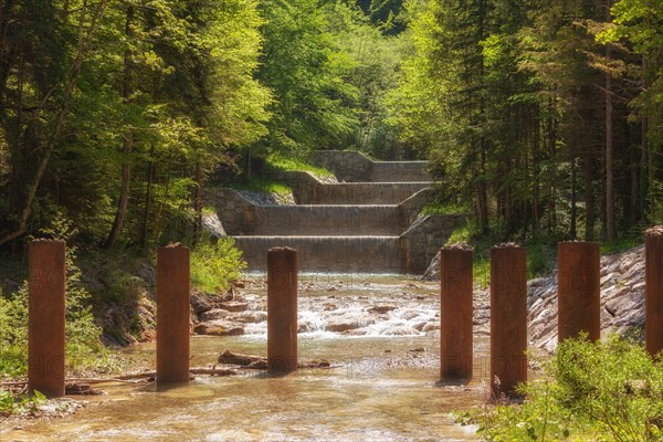 Driftwood barrier in the watercourse in the Jenbach near Bad Feilnbach