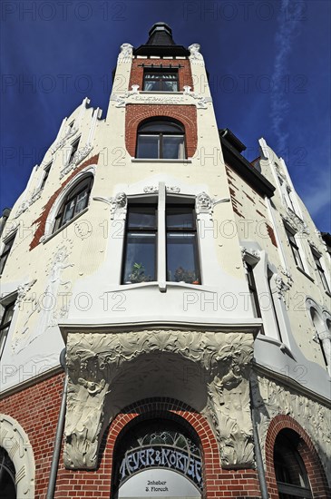 Facade and bay window with Art Nouveau ornaments of a house around 1900