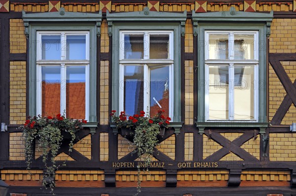 Window front with the brewers slogan