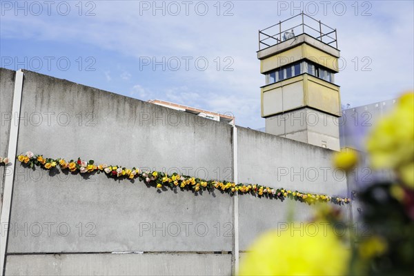 Roses stuck at the Berlin Wall memorial on the day of the fall of the Berlin Wall in Berlin, 09.11.2022., Berlin, Germany, Europe