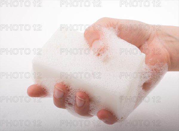 Hand washing and soap foam on a foamy background