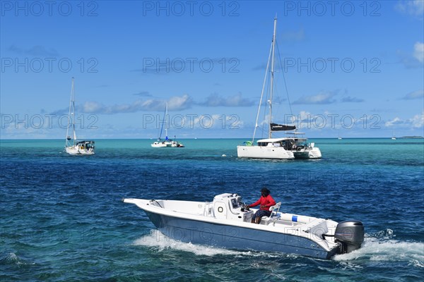 Sailing yachts anchor off Staniel Cay