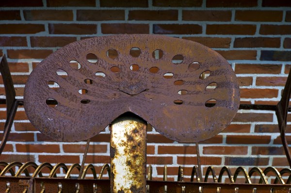 Rusty tractor seat