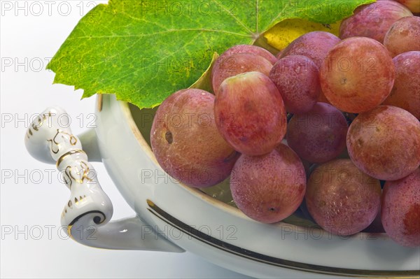 Grapes in an old porcelain bowl