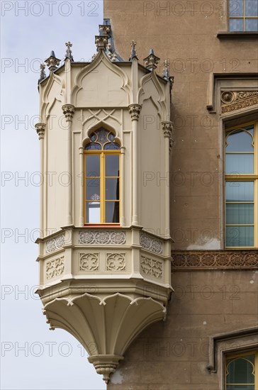 Neo-Gothic corner oriel on a historic building on the market square Neustrelitz