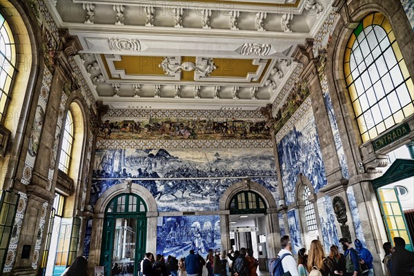 View of azulejos on walls of ornate interior of Arrivals Hall at Sao Bento Railway Station in Porto