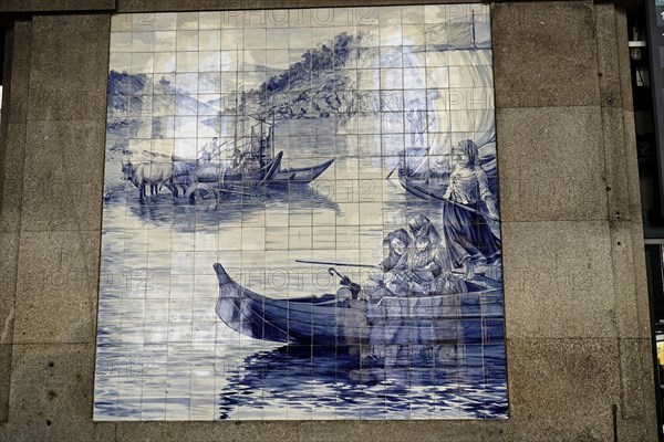 View of azulejos on walls of ornate interior of Arrivals Hall at Sao Bento Railway Station in Porto