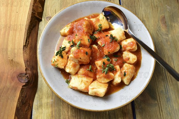 Gnocchi with tomato sauce and herbs