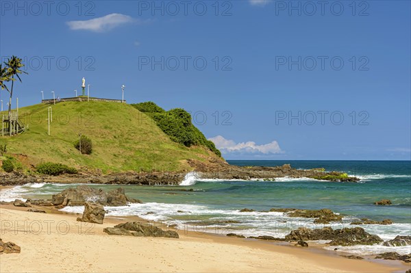 View of hill of Christ and the ocean located on the beach of Barra urban coast of Salvador in Bahia