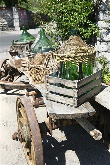 Still Life with Basket Bottles