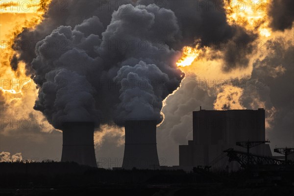 The Schwarze Pumpe coal-fired power plant stands out against the rising sun