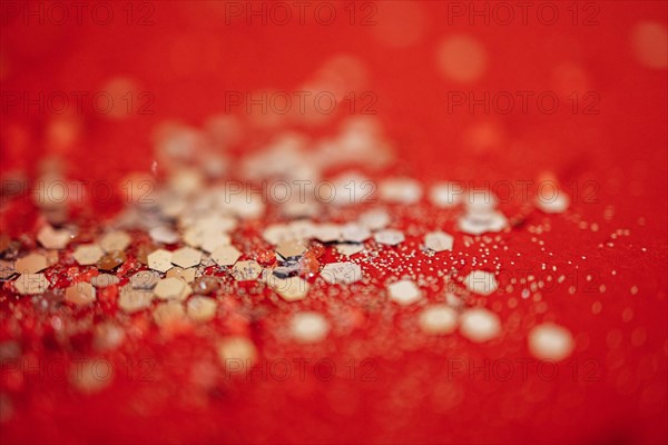 Red tone blurs the bokeh light. Defocused Red and orange holiday bokeh. Abstract christmas background