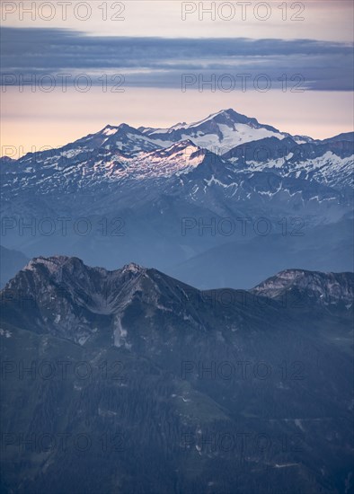 Mountain peak with glacier at sunrise