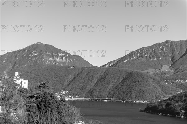 Church of Saints Fedele and Simone and Lake Lugano with Mountain in a Sunny Day in Vico Morcote