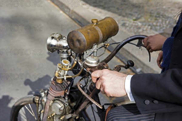 Old bicycle with auxiliary motor