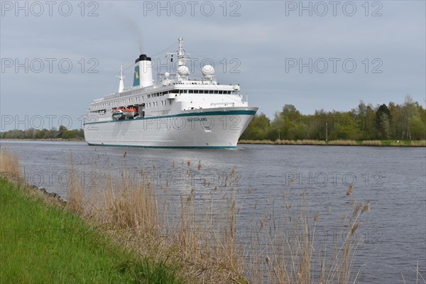 Cruise ship Deutschland sails from Kiel to Brunsbuettel in the Kiel Canal