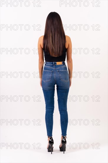 Brunette woman in casting photos on a white background