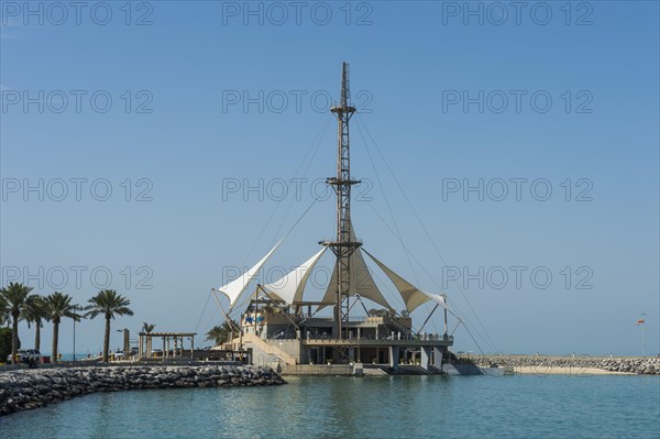 Futuristic looking restaurant on the beachfront of Kuwait City