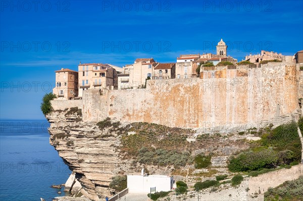 Steep coast of Bonifacio with old town on a limestone plateau