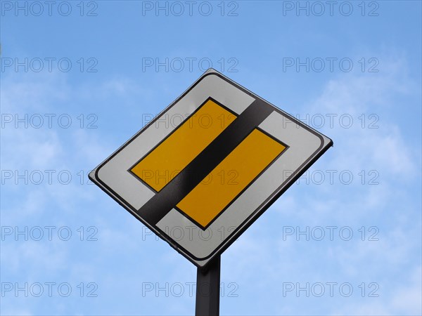 End of priority road sign