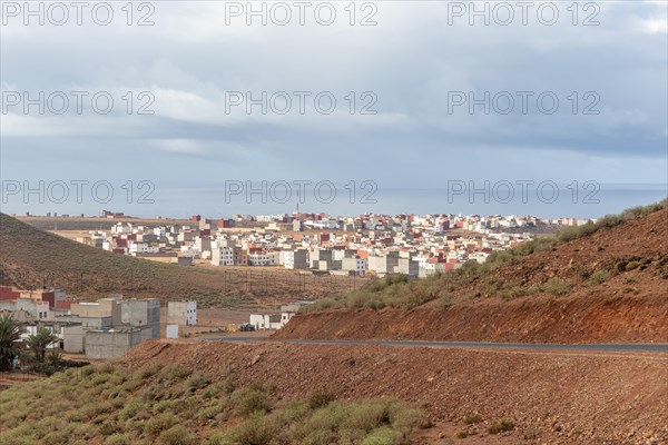 Oblique view over coastal town to Atlantic Ocean