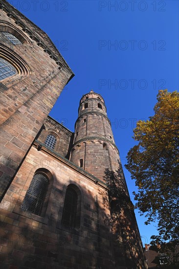 Ower of Roman Catholic St Peter's Cathedral in city Worms in Germany with blue sky
