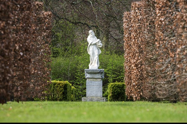 Statue in the Annevoie Castle Garden