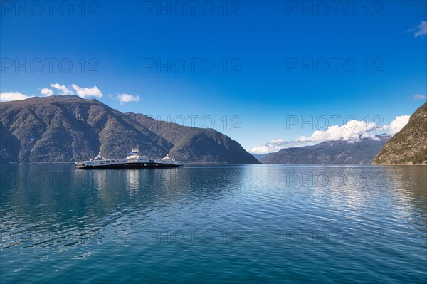 Ferry crossing the Sognefjord between Fodnes and Manheller