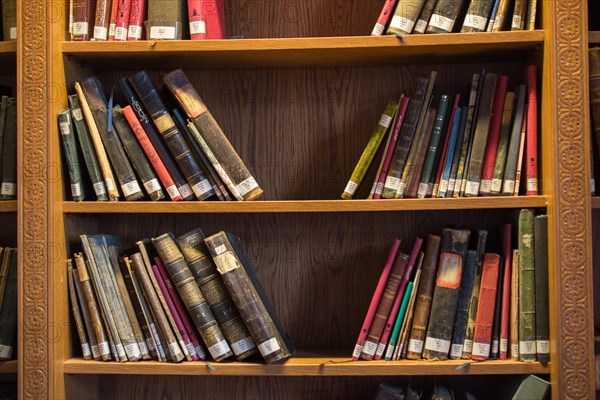 Bookshelf with old Turkish Ottoman handwriting books