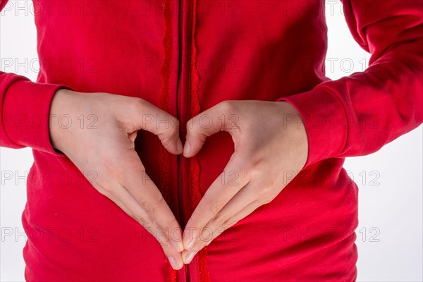 Hand making a heart on a white background