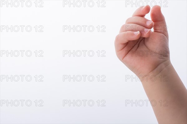 Hand of a baby on a white background