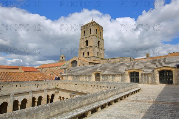 View of church tower and courtyard with cloister