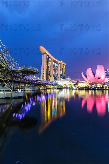 Marina Bay Skyline and Helix Bridge in the evening in Singapore