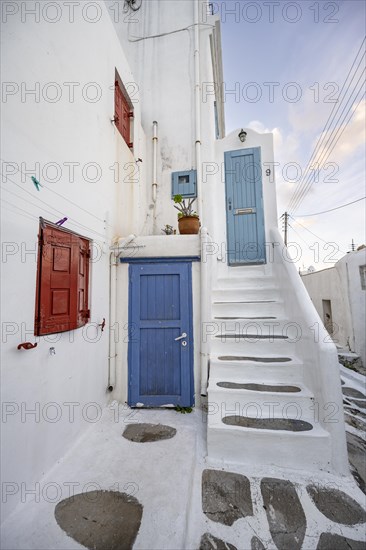 Cycladic white houses with colourful shutters