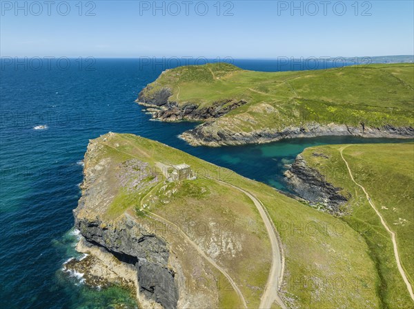 Aerial view of Port Quin with Doyden Castle