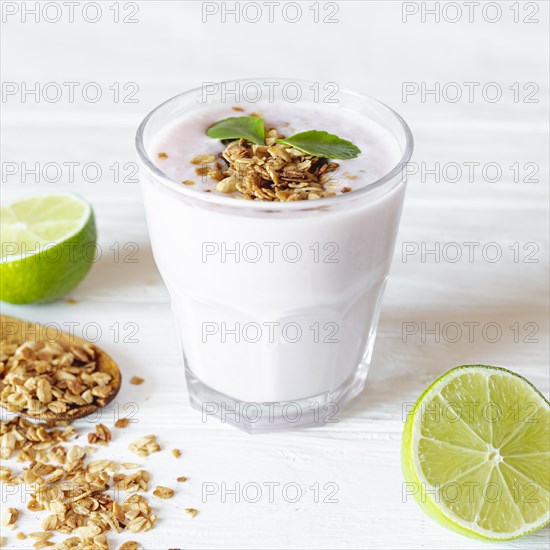 Jar yogurt half cutted lime