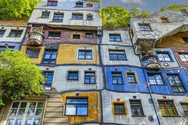 Green and colourful facade of the Hundertwasser House