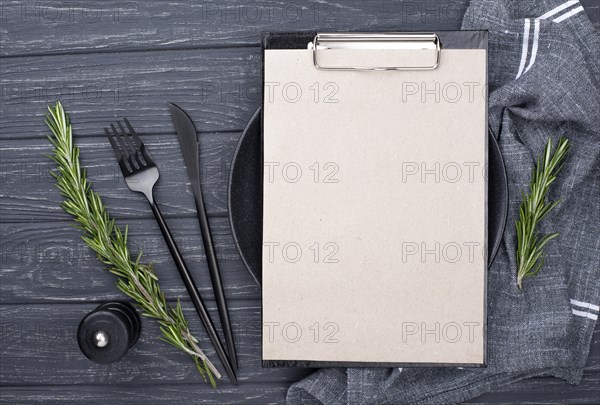Clipboard table with plate cutlery
