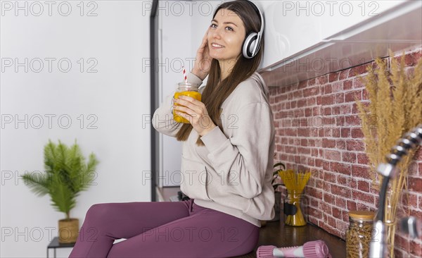 Medium shot woman with drink