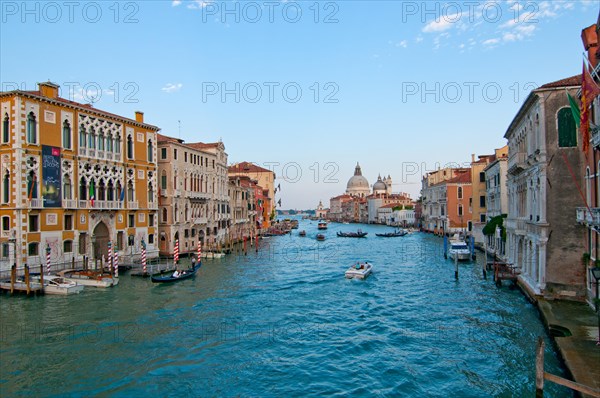 Venice Italy grand canal view from the top of Accademia bridge with Madonna della Salute church on background