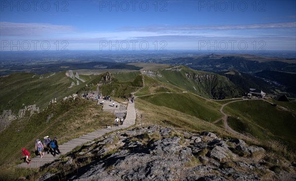 Hiking trail over wooden steps up to the Pic de Sancy