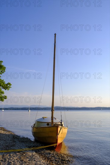 Small sailboat on the shore